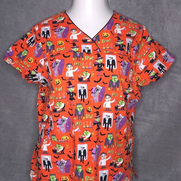 Halloween-Themed ScrubStar Womens Scrub Top L Orange Cartoon Monsters Print - Picture 1 of 5